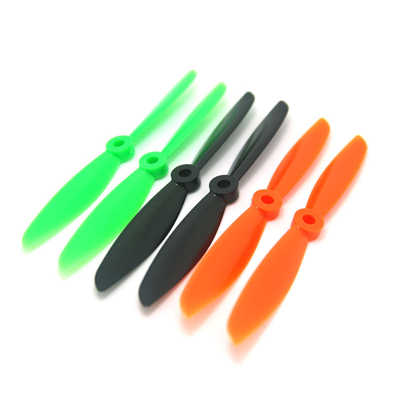 Gemfan 6045 6x4.5 quadcopter prop set, 2-blade pairs in green, black, and orange