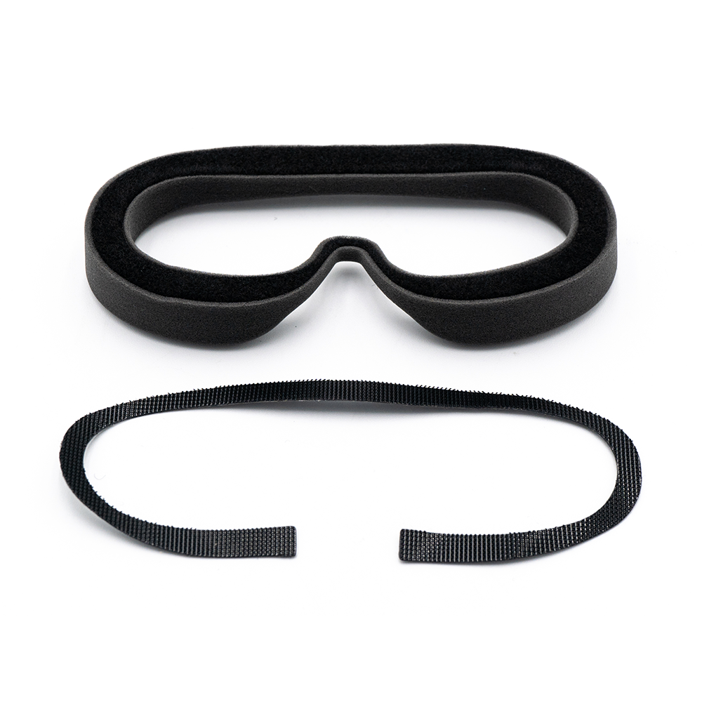 Foam goggle face padding with matching adhesive hook-and-loop strip for mounting