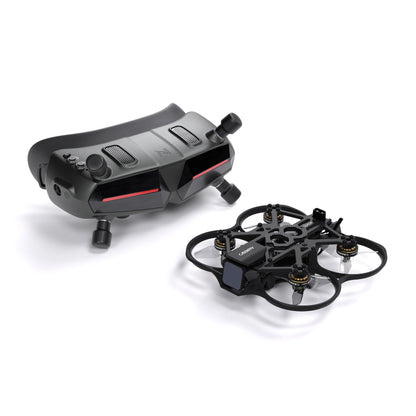 Walksnail Avatar HD Goggle and small cinewhoop-style FPV drone on white background, three-quarter view