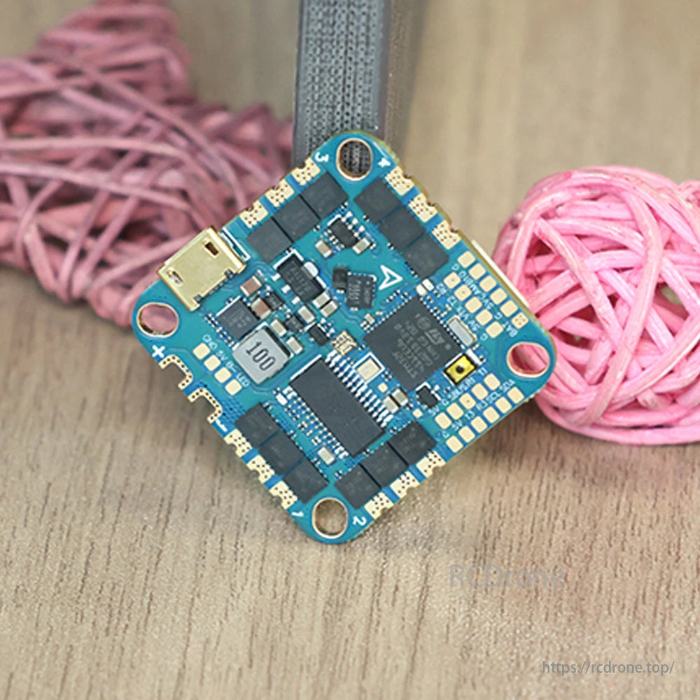 HAKRC F411 40A AIO Flight Controller, HAKRC F411 AIO Flight Controller features STM32F411, BLHeli_S 40A ESC, and 25.5mm mount for seamless drone integration.