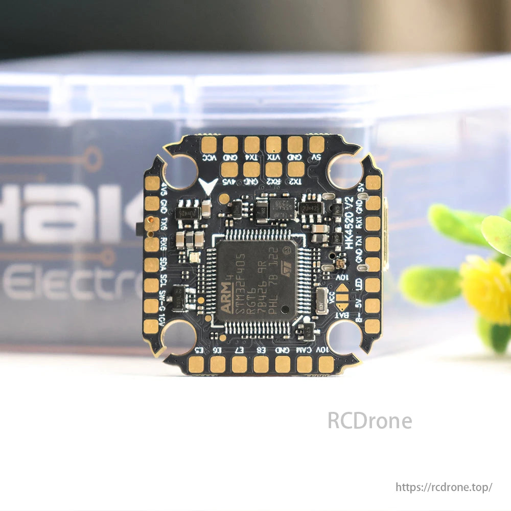 HAKRC F4520 V2 Flight Controller with ARM STM32F405, designed for drones with multiple connections and integrated components.