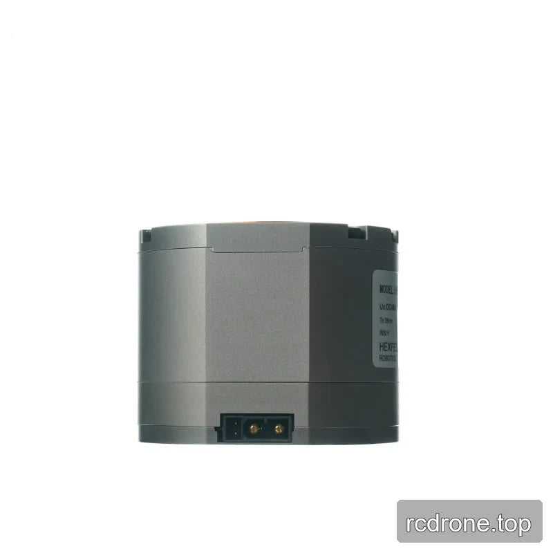 Side and lower connector view of the gray HEXMOTOR 4310 housing with part of the specification label visible.