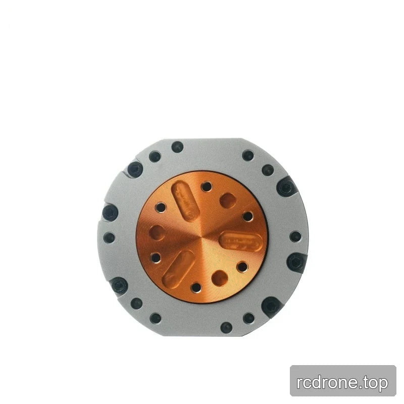 Front-facing close view of the HEXMOTOR 4310 orange circular mounting plate with holes and surrounding fasteners.