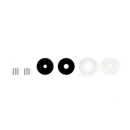 Gimbal damper parts layout with two metal sleeves, two black spacers, and two white silicone damper pieces