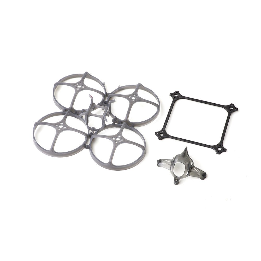 Petrel 85Whoop frame kit parts laid out: duct frame, carbon plate, camera hood