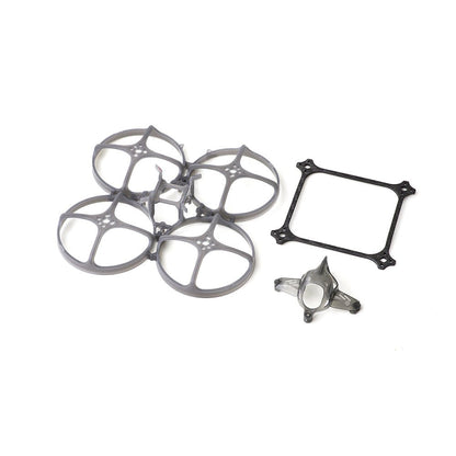 Petrel 85Whoop frame kit parts laid out: duct frame, carbon plate, camera hood