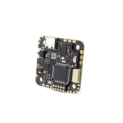 Angled view of SPECTER 25A AIO board showing edge connector, components, and mounting holes