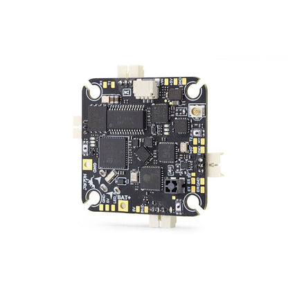 Bottom side of HGLRC SPECTER F411 12A AIO board showing wiring pads, chips, and connectors