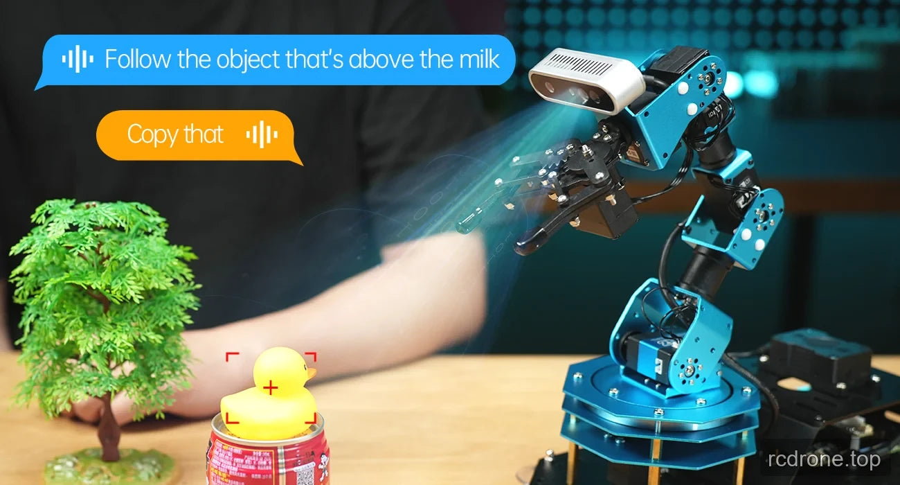 ArmPi Ultra targeting a yellow duck above a container in a voice-directed tracking demonstration