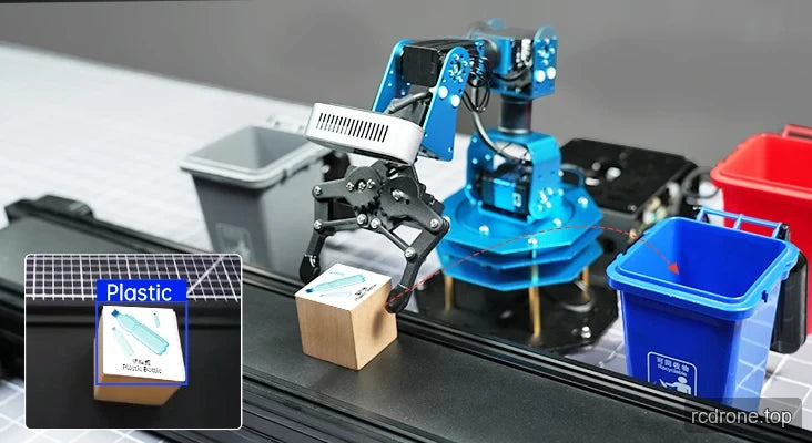 Robot arm sorts a plastic-labelled block from a conveyor toward a blue waste bin