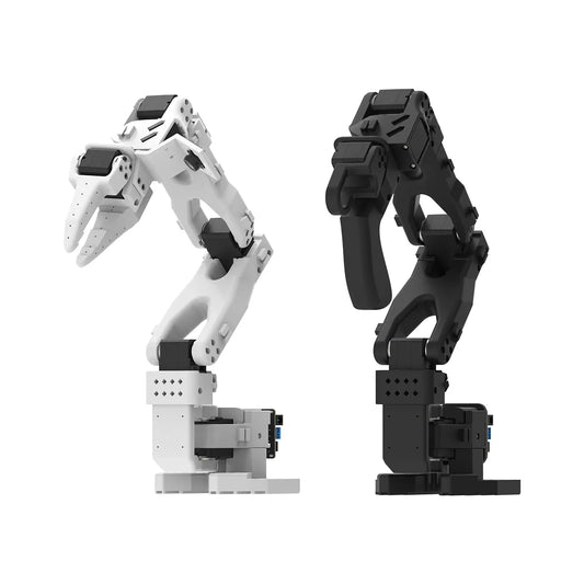 White gripper-equipped SO-ARM101 robotic arm beside a black handle-equipped arm on a white background.
