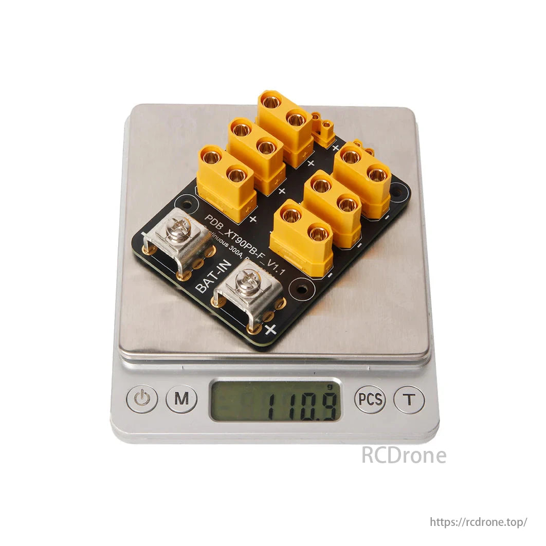 Holybro PDB 300A with XT90 connectors has a scale weight of 11.9 grams.