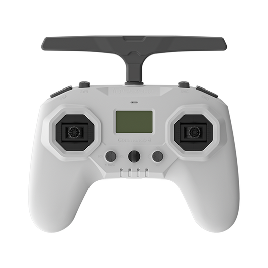 iFlight Commando 8 Pro radio transmitter in white with top antenna, dual gimbals, switches, and small display
