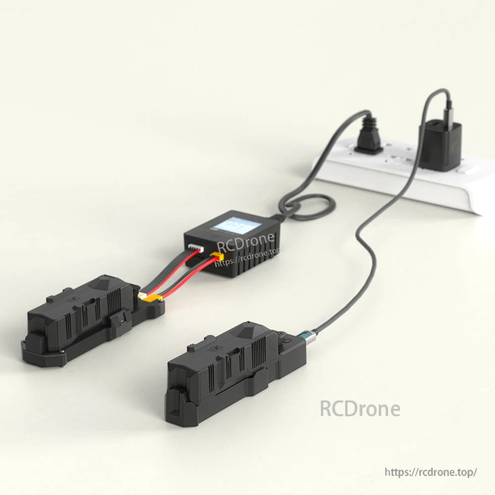 iFlight Defender 25 4S HD FPV, Two iFlight Defender 25 drone battery packs connected to a compact charger with display, plugged into an AC outlet