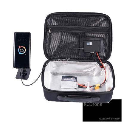 Open iFlight heated battery case with insulated lining, built-in control screen, and LiPo battery charging a phone via USB
