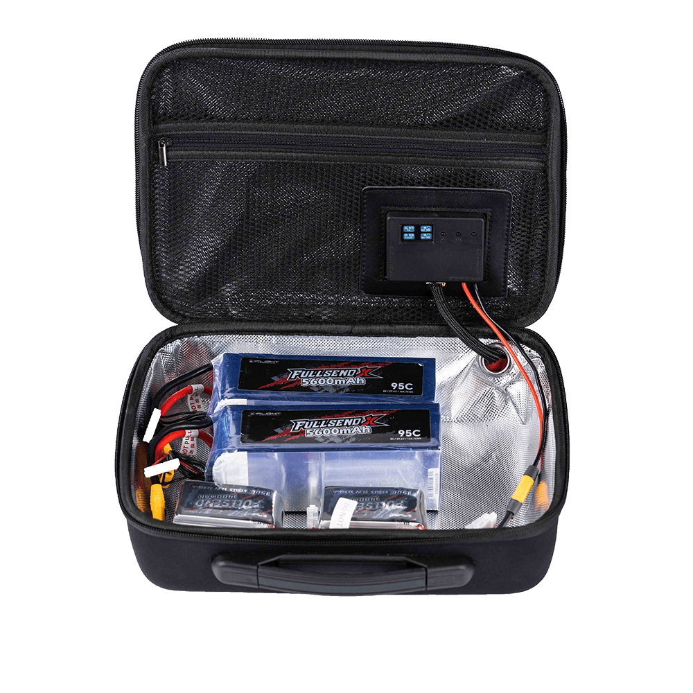 Open iFlight portable heated battery case with reflective lining, control panel, and LiPo batteries inside