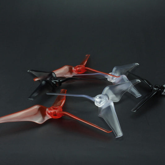 EMAX Avan Flow 5x4.3x3 5-inch 3-blade FPV racing propellers in mixed colors on dark background