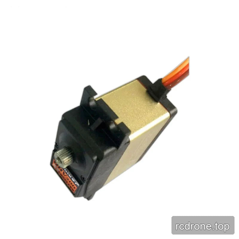 Diagonal side view of the black and gold servo, highlighting the cable entry, mounting tabs, and projecting splined shaft.