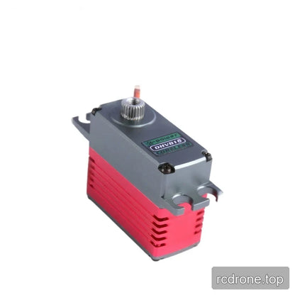 DHV816 servo seen from a narrow-end angle, with pink-red ribs, gray mounting tabs and a short wire behind the shaft.