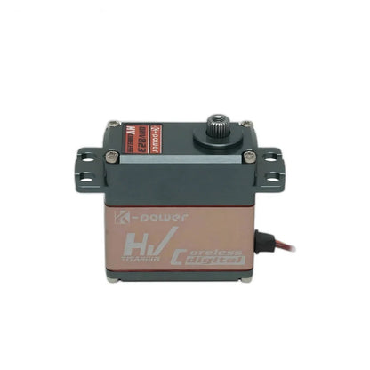 Straight-on view of servo showing the bronze-colored labeled side, top output shaft, mounting tabs and right-side wire exit.