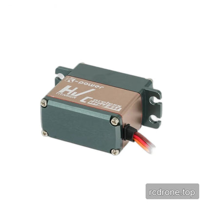 Tilted servo showing the dark green bottom plate with four screws, copper-colored housing, and red, orange, and brown lead.