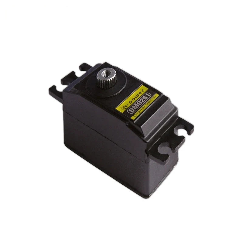 Black Kpower DM0261 servo viewed from above, showing the metal splined shaft, yellow label, and mounting tabs.