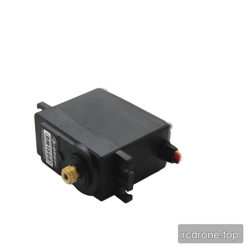 Black DM1500 servo lying diagonally, showing its broad casing, splined shaft, mounting tabs and wire exit.