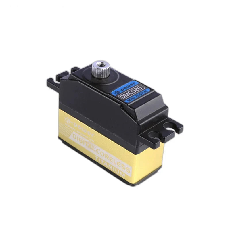 Three-quarter view of the DMC026 servo with its top model label, silver shaft, gold end panel and slotted mounting tabs.