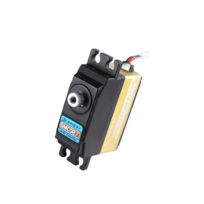 DMC027 servo tilted upright, showing the front model label, splined shaft, gold side housing, and mounting slots.