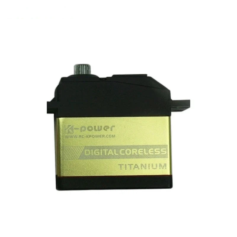 Gold-colored servo with black top and base, splined shaft, and DIGITAL CORELESS and TITANIUM side markings.