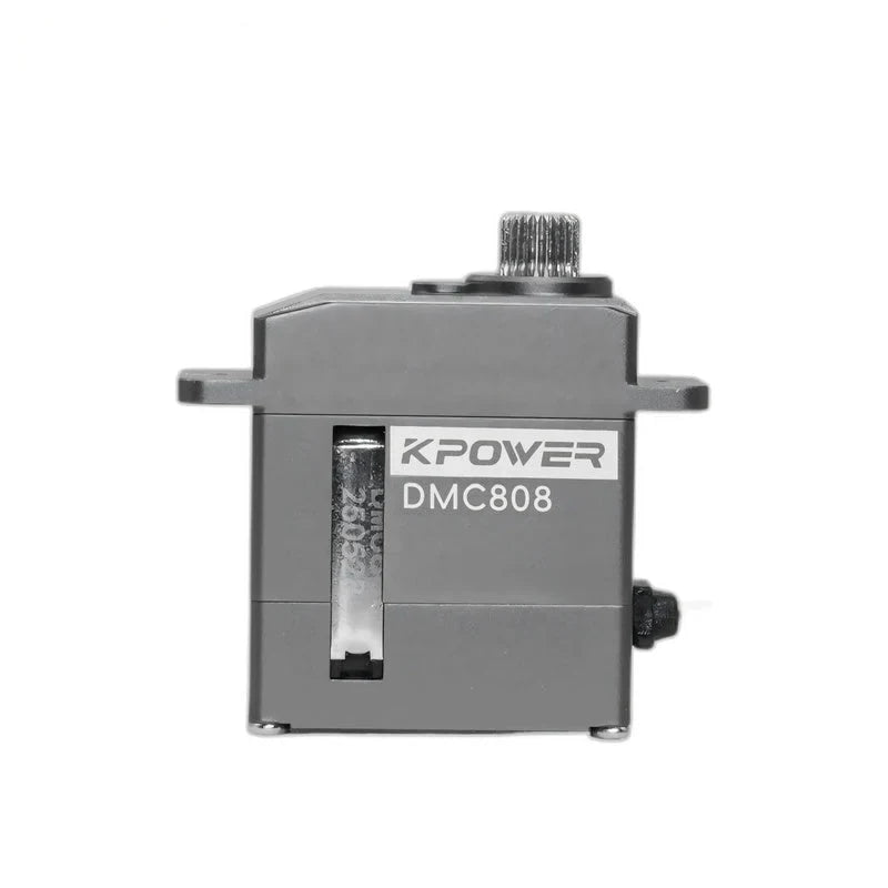 DMC808 servo viewed straight on, with its side label, narrow casing opening, upper splined shaft, and mounting tabs visible.