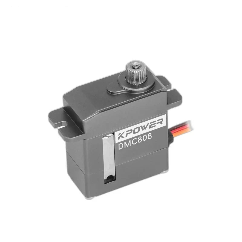 Gray DMC808 servo at a three-quarter angle, showing the labeled side, splined shaft, mounting tabs, and colored wires.