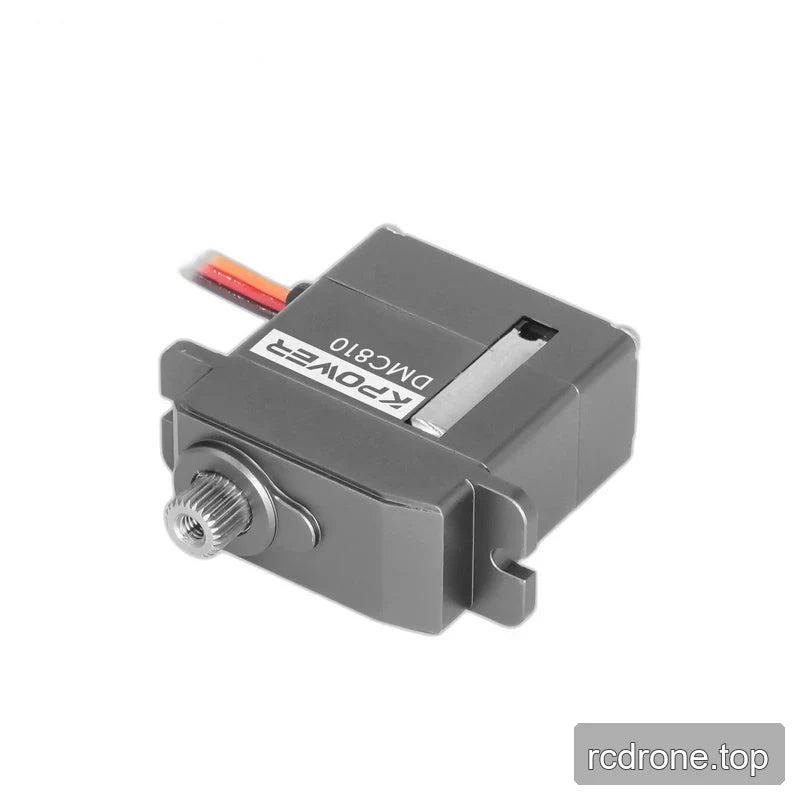 Gray servo reclining diagonally with its splined shaft toward the lower left, slotted mounting tabs, and upside-down label.