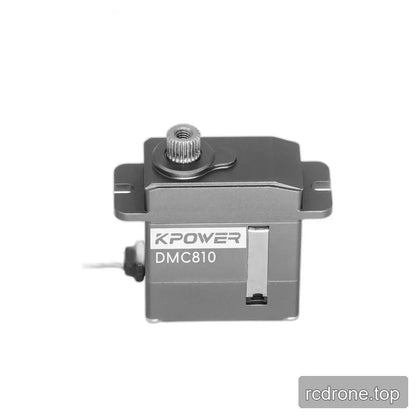 Front-facing gray servo with KPOWER DMC810 label, exposed shaft above, side mounting tabs, and lead exiting left.
