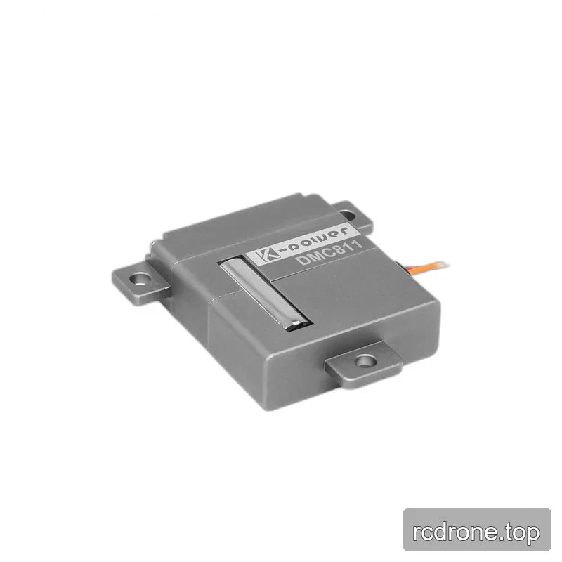 Gray DMC811 servo lying flat, showing its labeled face, recessed opening, three mounting tabs, and a short wire section.
