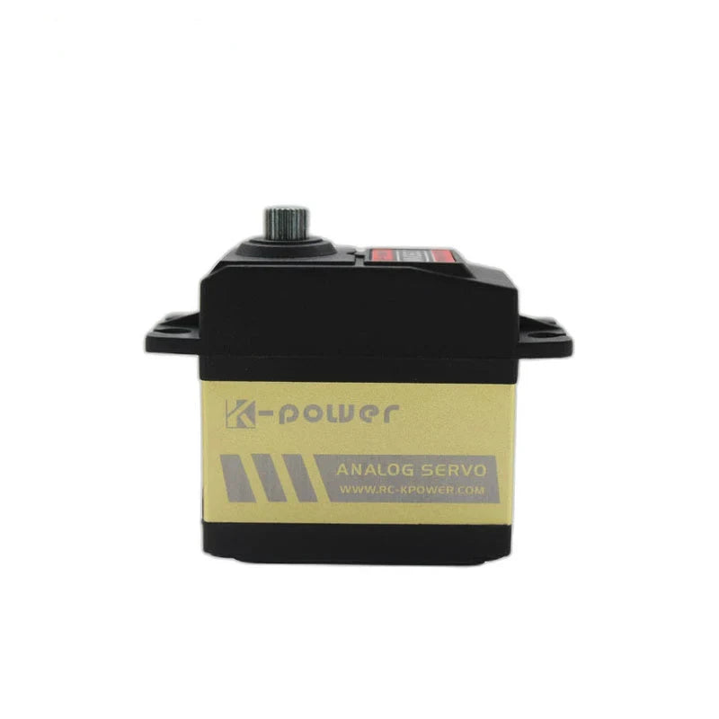 Straight-on view of the gold servo casing with K-power and ANALOG SERVO markings, black housing, and side mounting tabs.