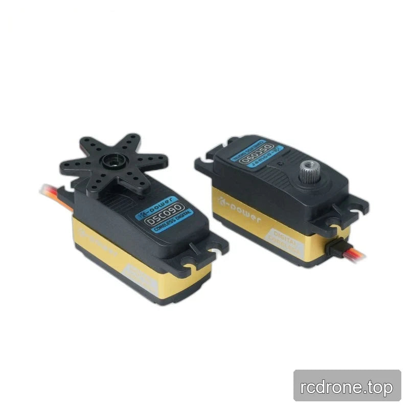 Two black and gold DSC090 servos side by side, showing a six-arm horn on one and an exposed splined shaft on the other.