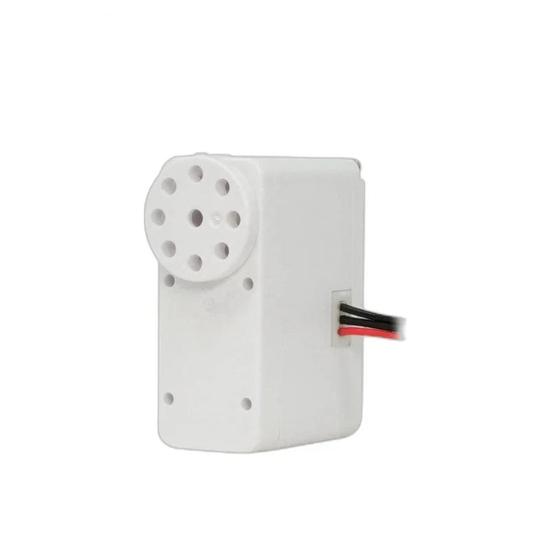 White Kpower servo with a perforated circular output disc and red and black leads extending from the right side.