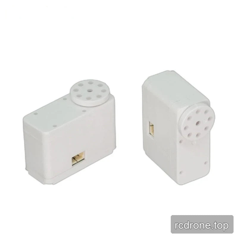 Two white servo views side by side in horizontal and upright orientations, showing circular output discs and side connectors.