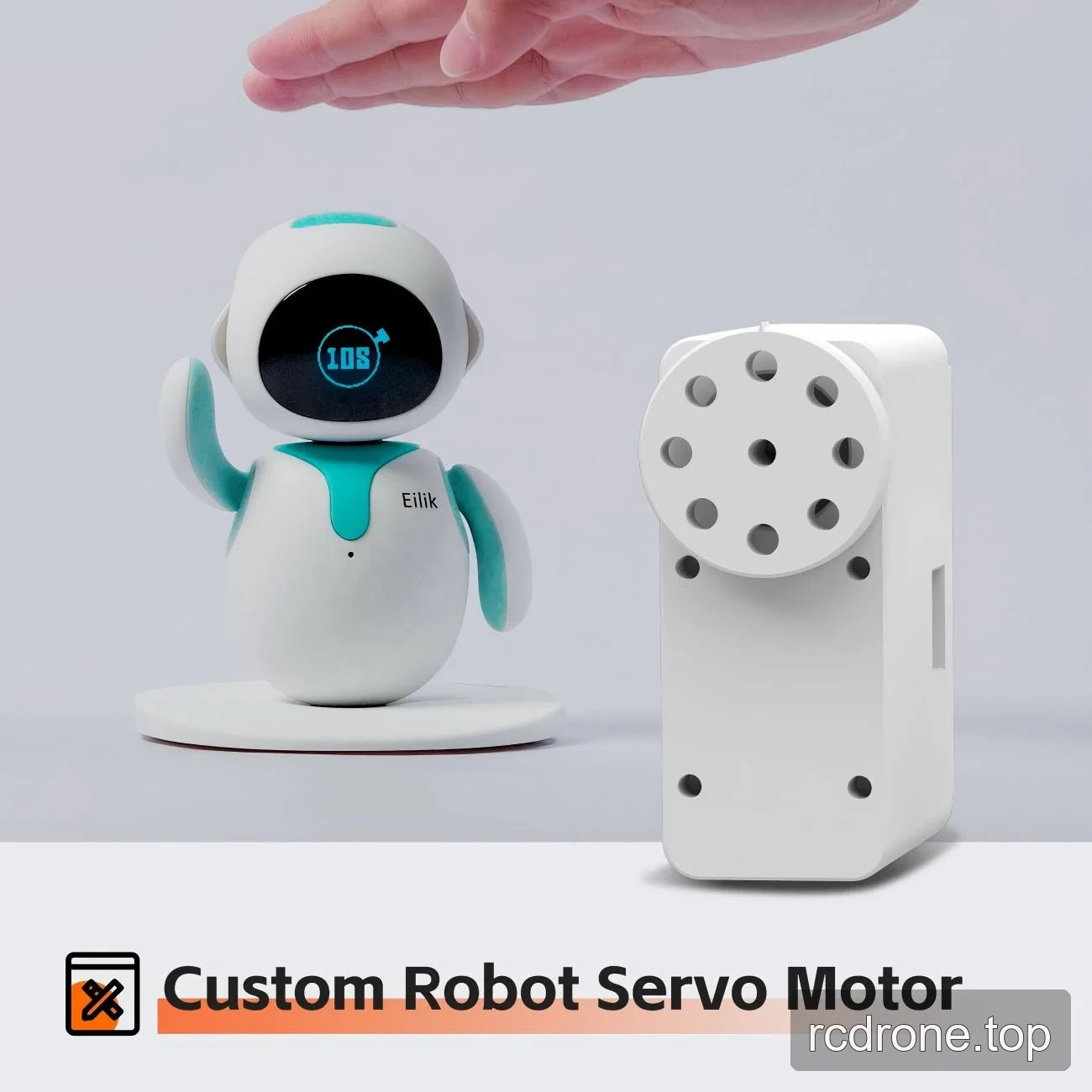 White robot servo beside an Eilik desktop companion robot