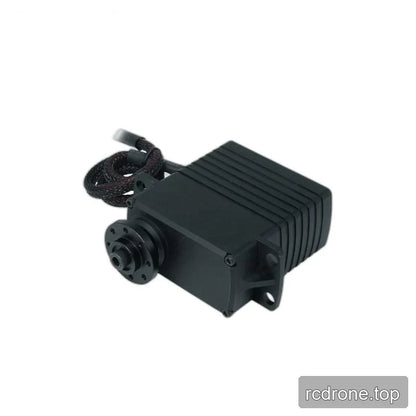 Diagonal view of the black servo with its output flange at lower left, deep housing ribs, mounting tabs, and braided cable.