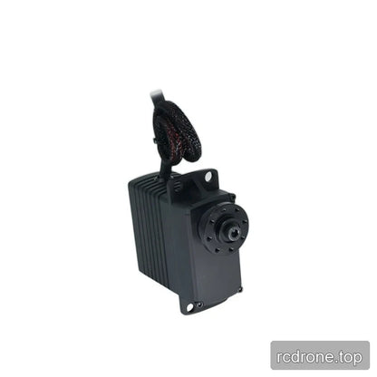 Oblique view of the servo output face, with a black circular flange, ribbed side casing, and cable loop above.