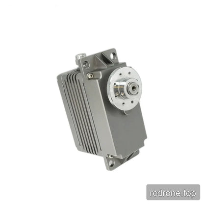 Diagonally tilted servo with a silver circular output hub, broad gray face, side fins, and mounting holes at both ends.