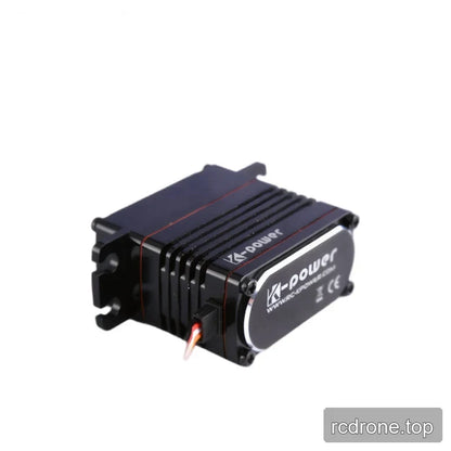 Black servo viewed from the cable side, showing the wire exit, ribbed casing, slotted mounting tabs, and bottom cover.