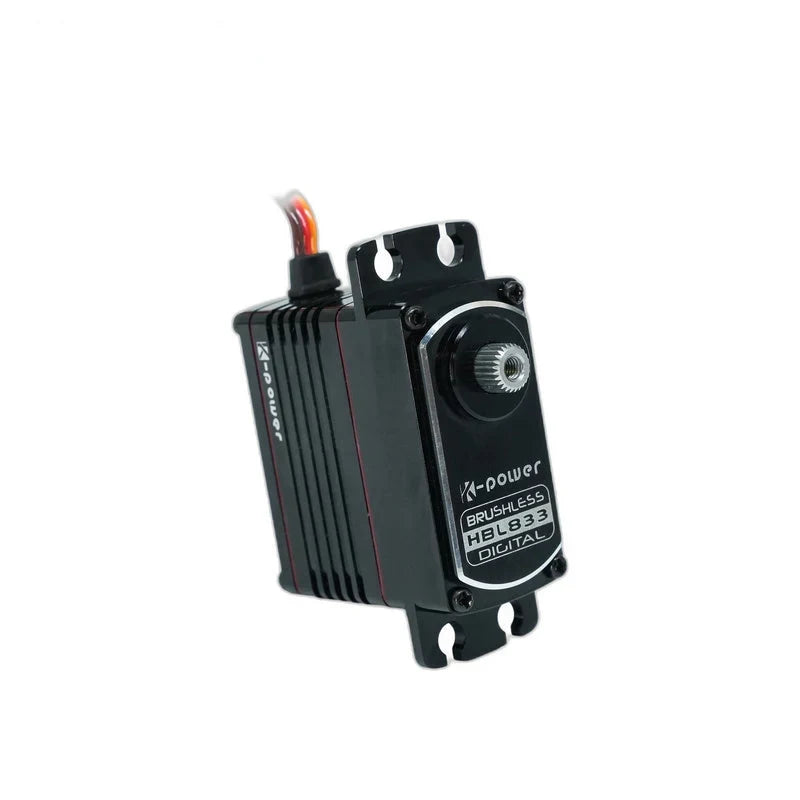 Upright HBL833 servo showing the Brushless Digital label, exposed splined output shaft, and slotted mounting tabs.