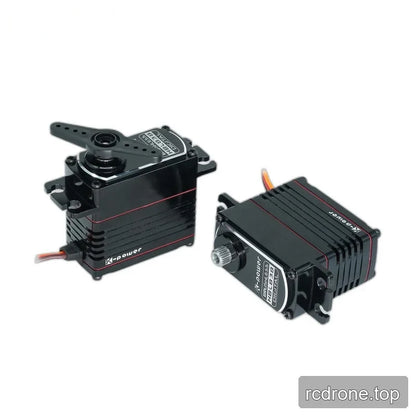 Two black HBL838 servo views showing an attached double-ended horn on one and an exposed splined shaft on the other.