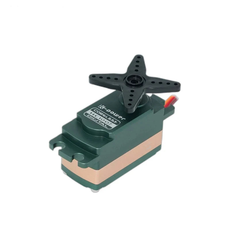 Green Kpower HC1007 servo viewed from above, showing its labeled top, black four-arm horn, and copper-colored band.