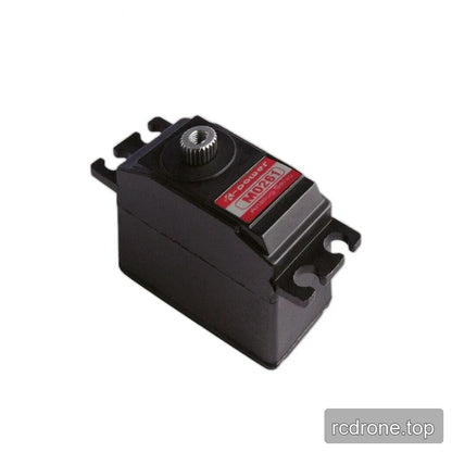 Black servo viewed from above, showing a red M0261 label, silver splined shaft with a central hole, and mounting tabs.