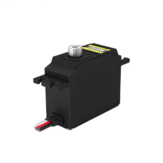 Black servo with yellow top label, silver splined output shaft, mounting tabs, and wires exiting the lower housing.