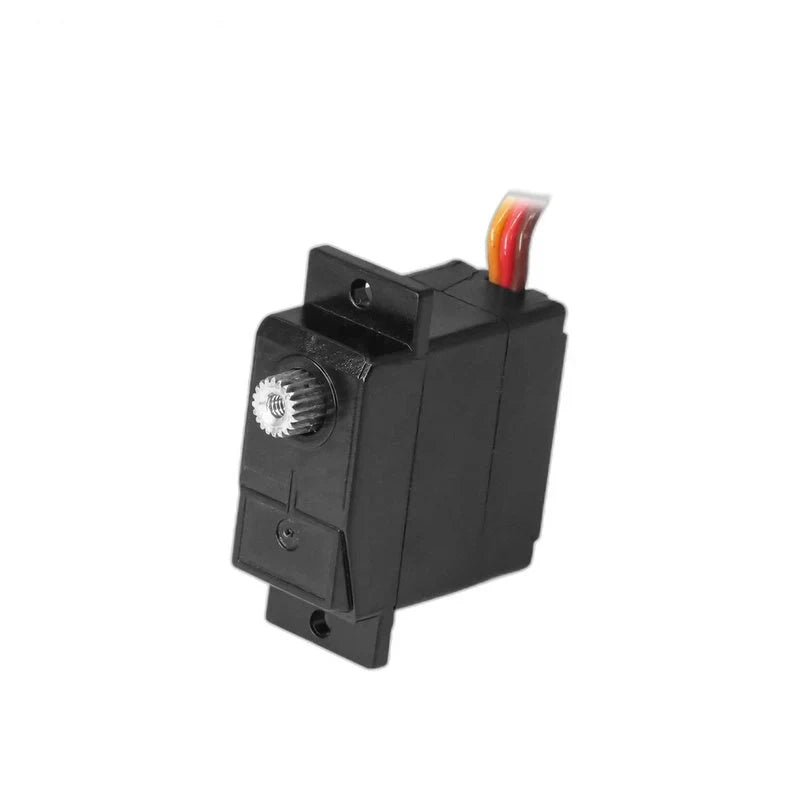 Vertically rotated black servo showing the silver output shaft, upper and lower mounting holes, and wires at the top.